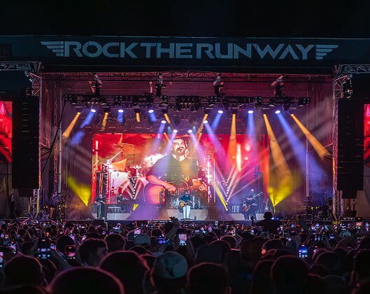 Rock The Runway artist on stage